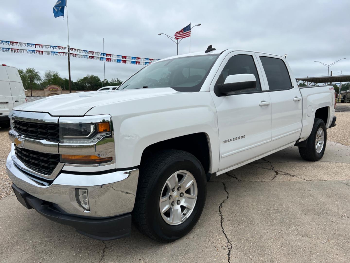 2018 White /Gray Chevrolet Silverado 1500 LT (3GCUKREC2JG) with an 5.3L V8 engine, Automatic transmission, located at 4520 Airline Hwy, Baton Rouge, LA, 70805, (225) 357-1497, 30.509325, -91.145432 - 2018 Chevrolet Silverado Crew Cab LT 4X4 5.3 V8 Gas, 142K Miles, Power Windows, Locks & Mirrors, Cold A/C, Transmission Has 12 Month Warranty, Tow Pkg, Good Tires. FOR INFO PLEASE CONTACT JEFF AT 225 357-1497 CHECK OUT OUR A+ RATING WITH THE BETTER BUSINESS BUREAU WE HAVE BEEN A FAMILY OWNED AND OPE - Photo#0